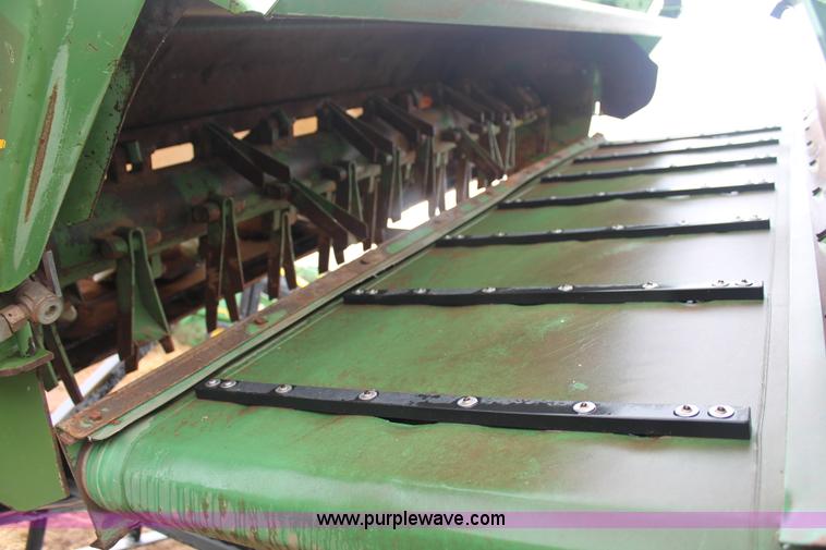 image for item H1630 (2) 2005 Krone disc mower windrowers with shop built trailer