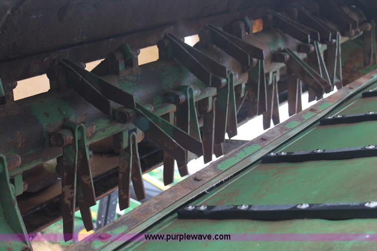 image for item H1630 (2) 2005 Krone disc mower windrowers with shop built trailer