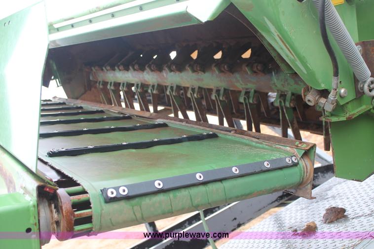 image for item H1630 (2) 2005 Krone disc mower windrowers with shop built trailer