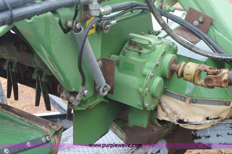 image for item H1630 (2) 2005 Krone disc mower windrowers with shop built trailer