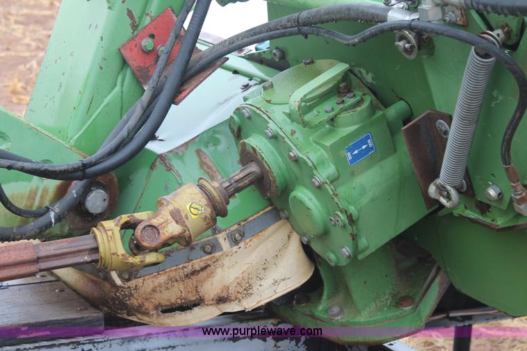 image for item H1630 (2) 2005 Krone disc mower windrowers with shop built trailer