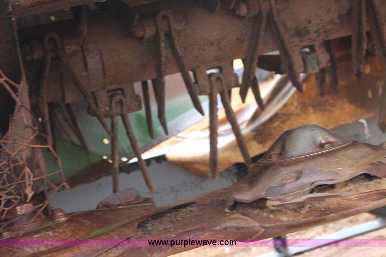 image for item H1630 (2) 2005 Krone disc mower windrowers with shop built trailer