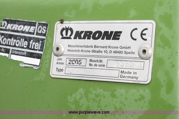 image for item H1630 (2) 2005 Krone disc mower windrowers with shop built trailer