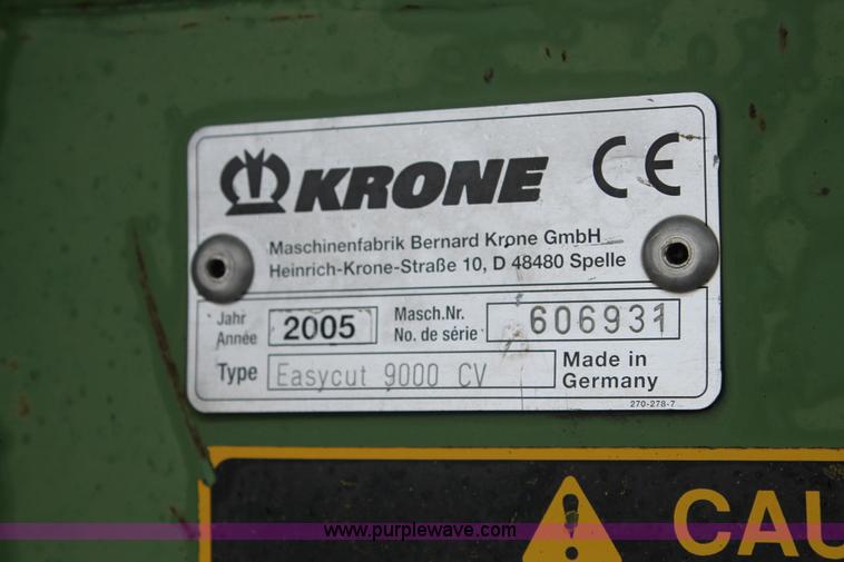 image for item H1630 (2) 2005 Krone disc mower windrowers with shop built trailer