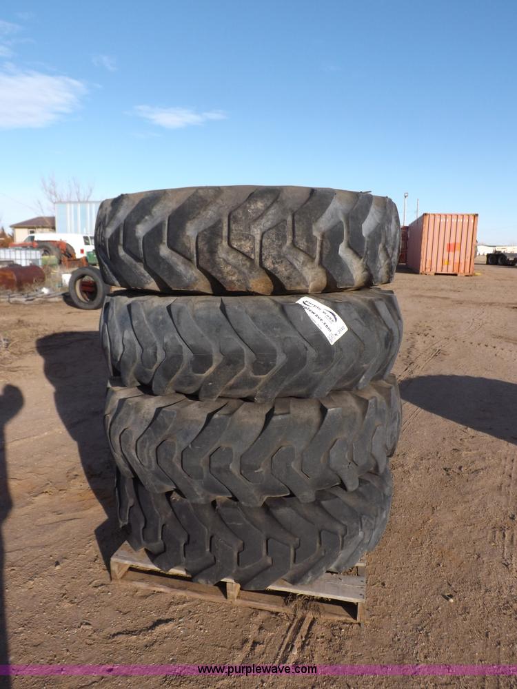 (4) Firestone loader tires and wheels in Sublette, KS Item K3140 sold
