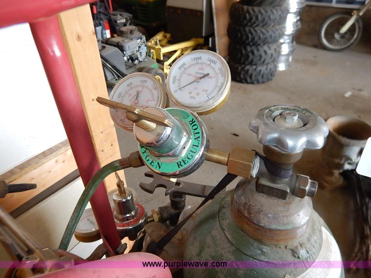 Cutting torch and bottles in Abilene, KS Item BC9812 sold Purple Wave