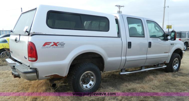 image for item D6112 2003 Ford F250 Super Duty XLT Crew Cab pickup truck
