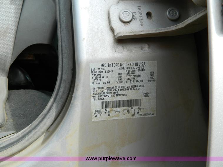 image for item D6112 2003 Ford F250 Super Duty XLT Crew Cab pickup truck