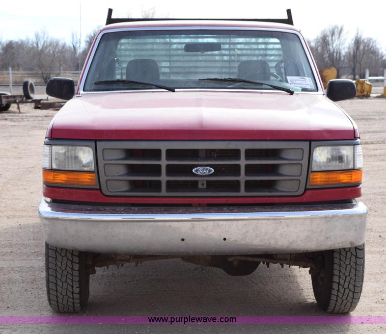 image for item K2302 1994 Ford F250 XL HD flatbed pickup truck