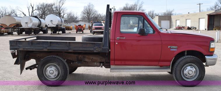 image for item K2302 1994 Ford F250 XL HD flatbed pickup truck