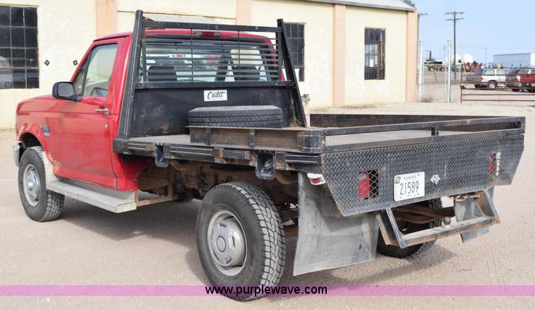 image for item K2302 1994 Ford F250 XL HD flatbed pickup truck