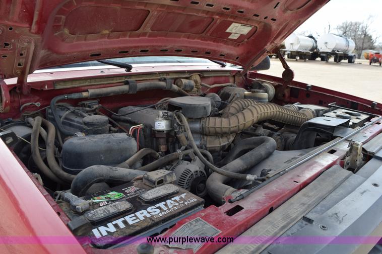 image for item K2302 1994 Ford F250 XL HD flatbed pickup truck