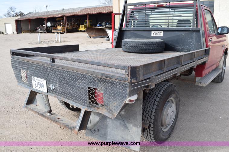image for item K2302 1994 Ford F250 XL HD flatbed pickup truck