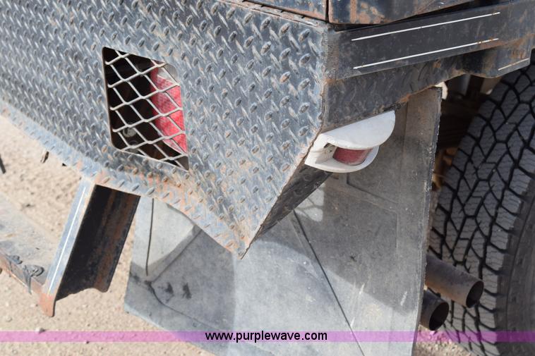 image for item K2302 1994 Ford F250 XL HD flatbed pickup truck