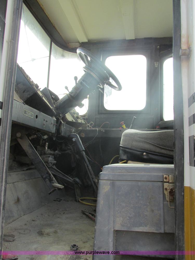 image for item AW9822 1992 Ag-Chem TerraGator 1803 applicator cab and chassis