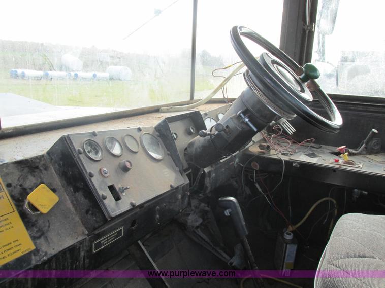 image for item AW9822 1992 Ag-Chem TerraGator 1803 applicator cab and chassis