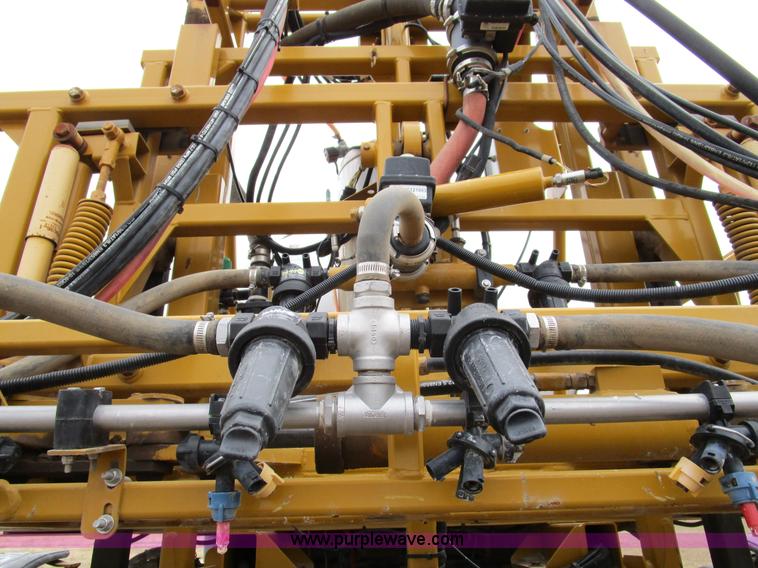 image for item D2300 2004 Ag-Chem RoGator 1064 self-propelled sprayer