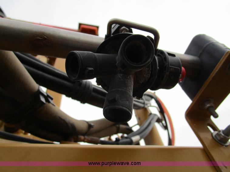 image for item D2300 2004 Ag-Chem RoGator 1064 self-propelled sprayer