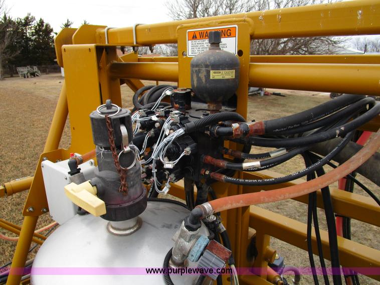 image for item D2300 2004 Ag-Chem RoGator 1064 self-propelled sprayer