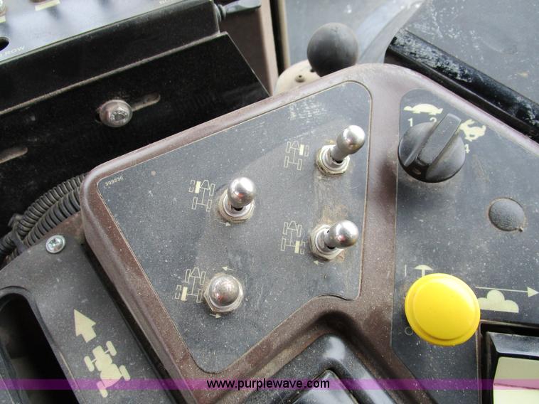 image for item D2300 2004 Ag-Chem RoGator 1064 self-propelled sprayer