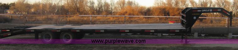 image for item K2813 2009 Circle M gooseneck flatbed trailer