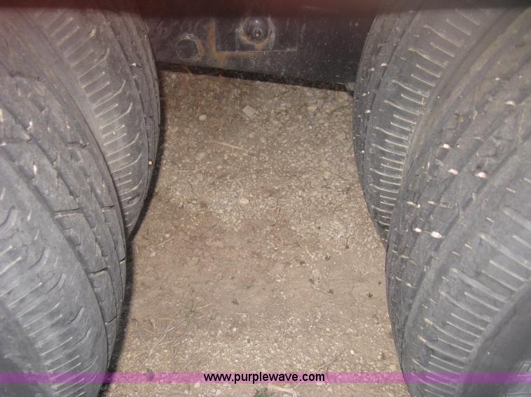 image for item K2813 2009 Circle M gooseneck flatbed trailer