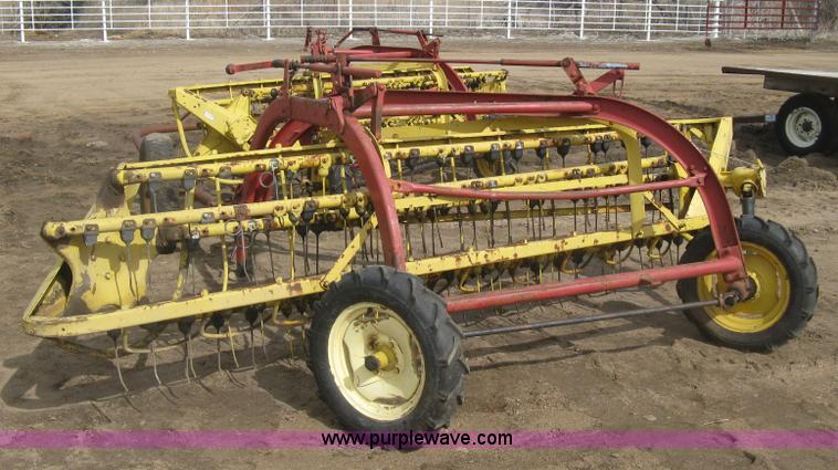 image for item K2910 New Holland hay rakes with tandem hitch