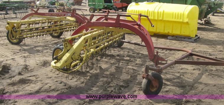 image for item K2910 New Holland hay rakes with tandem hitch
