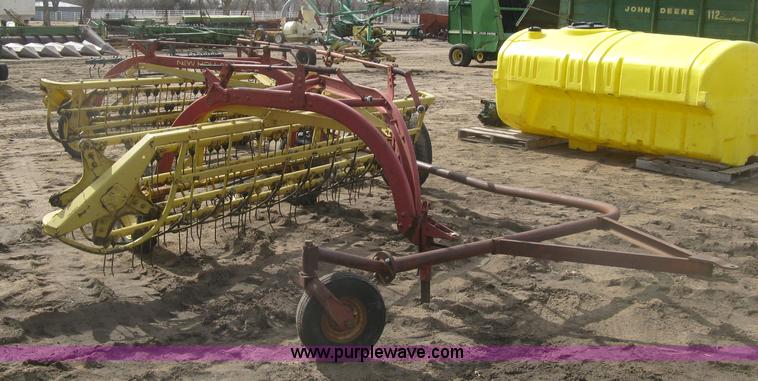 image for item K2910 New Holland hay rakes with tandem hitch