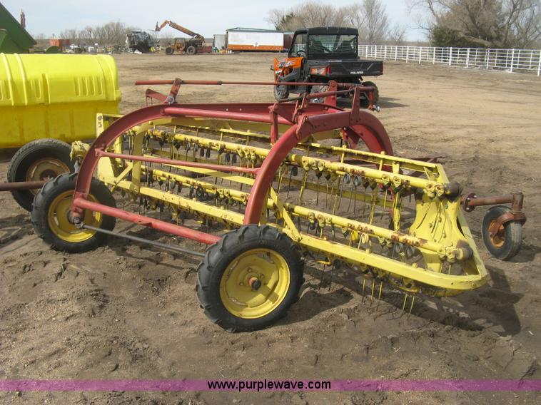 image for item K2910 New Holland hay rakes with tandem hitch
