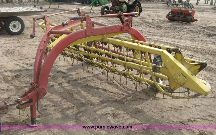image for item K2910 New Holland hay rakes with tandem hitch