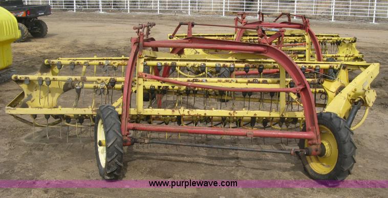 image for item K2910 New Holland hay rakes with tandem hitch