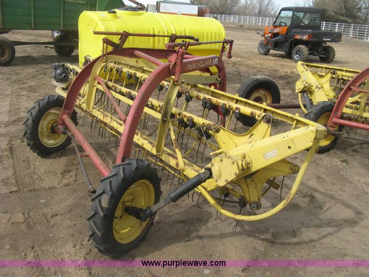 image for item K2910 New Holland hay rakes with tandem hitch