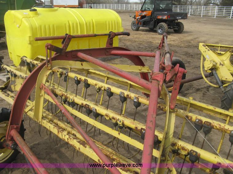 image for item K2910 New Holland hay rakes with tandem hitch