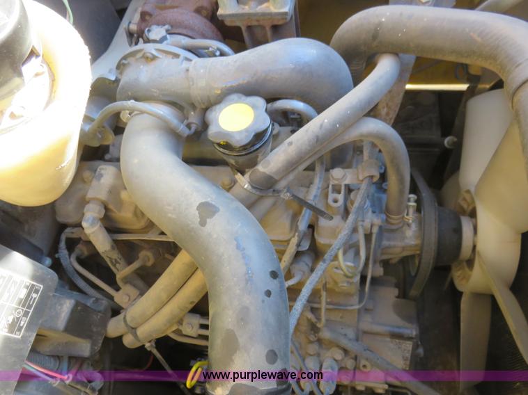 image for item K7186 2004 New Holland LS170 skid steer