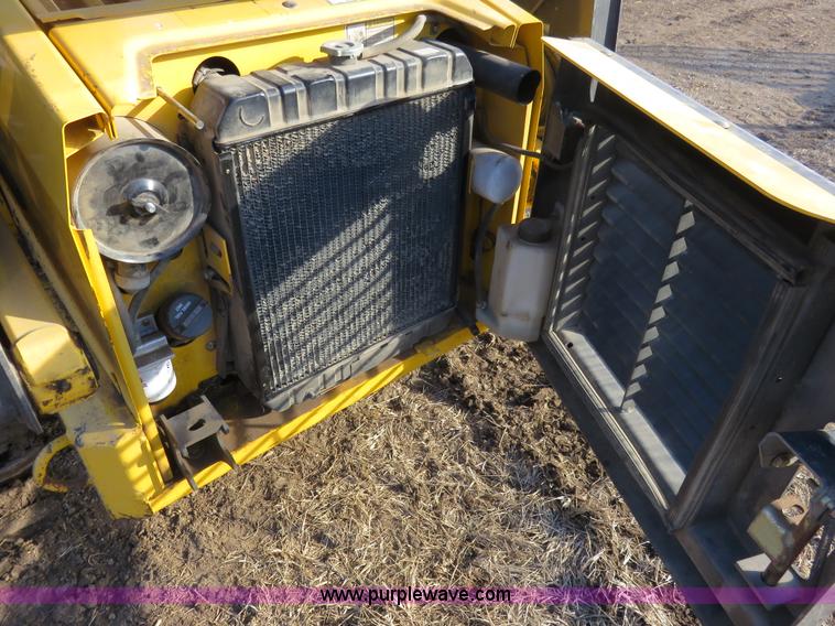 image for item K7186 2004 New Holland LS170 skid steer