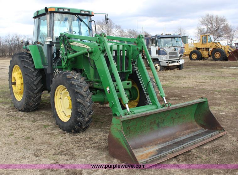 image for item L6635 2001 John Deere 7710 MFWD tractor
