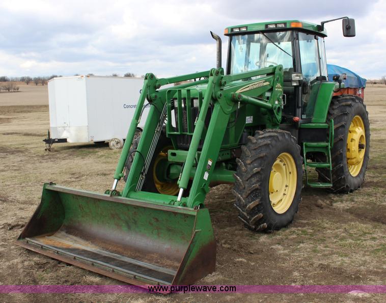 image for item L6635 2001 John Deere 7710 MFWD tractor