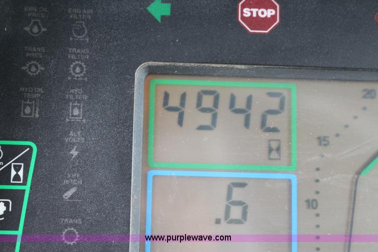 image for item L6635 2001 John Deere 7710 MFWD tractor