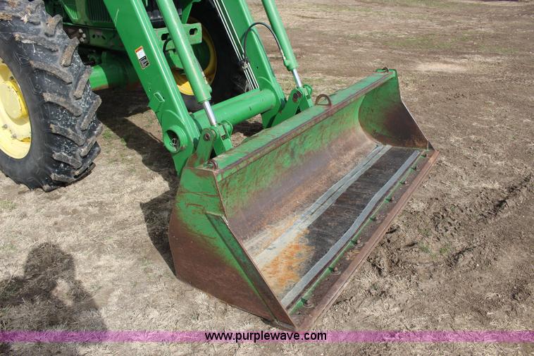 image for item L6635 2001 John Deere 7710 MFWD tractor