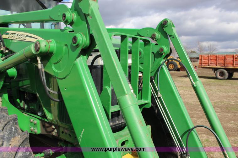 image for item L6635 2001 John Deere 7710 MFWD tractor