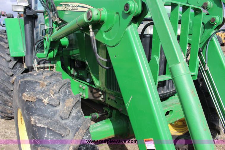 image for item L6635 2001 John Deere 7710 MFWD tractor