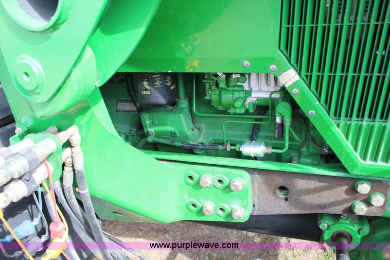 image for item L6635 2001 John Deere 7710 MFWD tractor