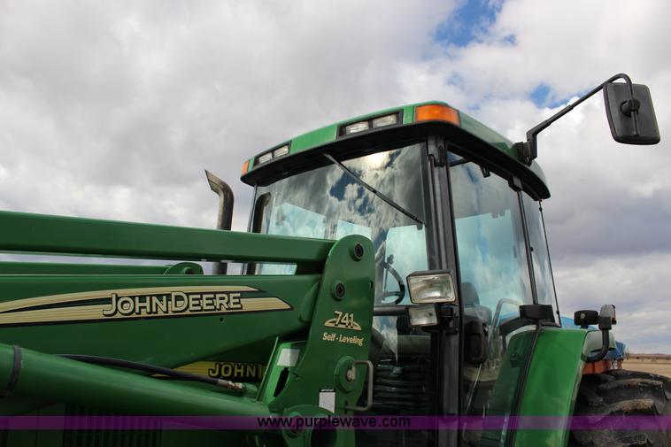 image for item L6635 2001 John Deere 7710 MFWD tractor