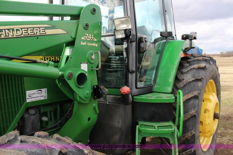 image for item L6635 2001 John Deere 7710 MFWD tractor