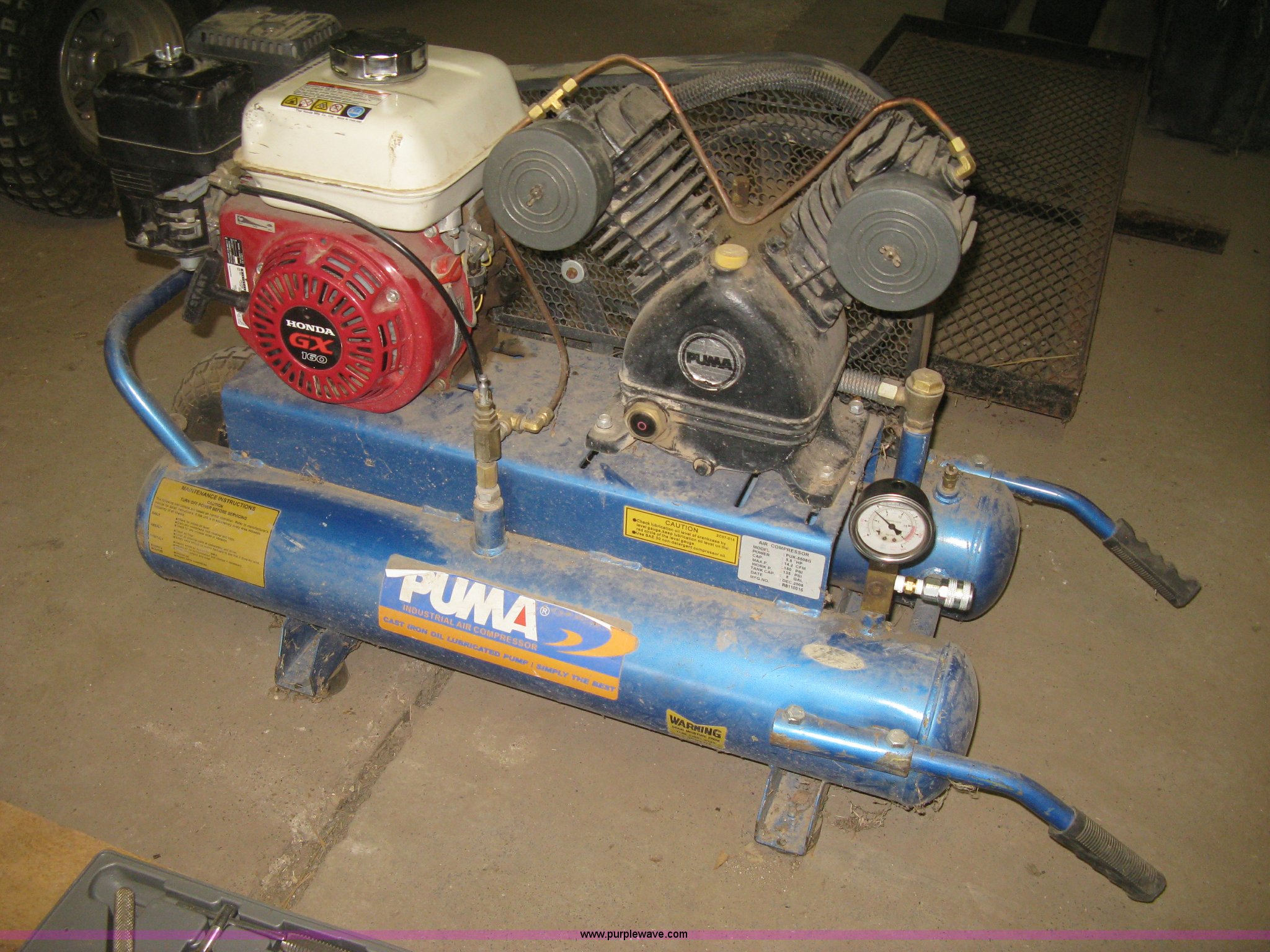 Puma Industrial air compressor in Lyons, KS Item BD9554 sold Purple