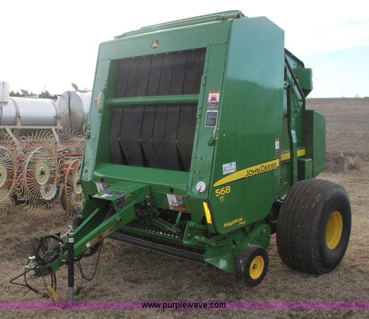 image for item F3466 2012 John Deere 568 round baler