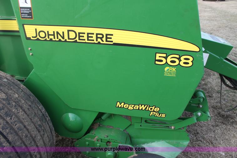 image for item F3466 2012 John Deere 568 round baler