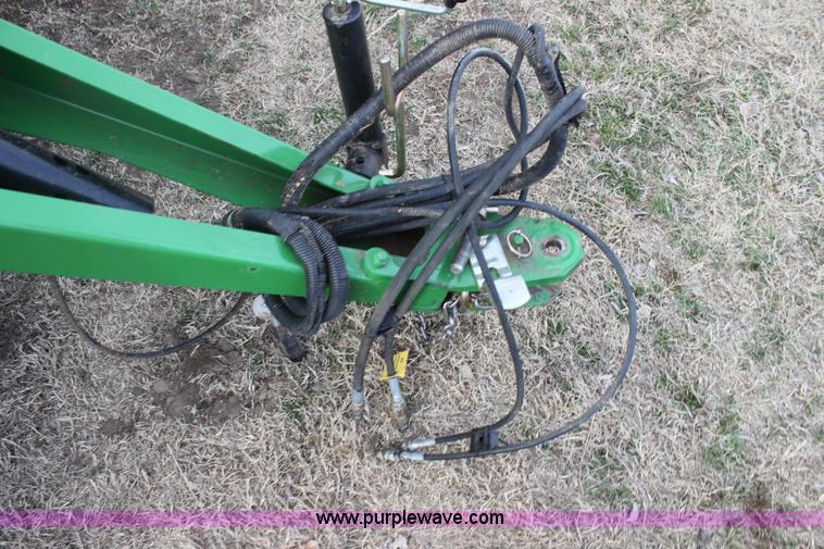 image for item F3466 2012 John Deere 568 round baler