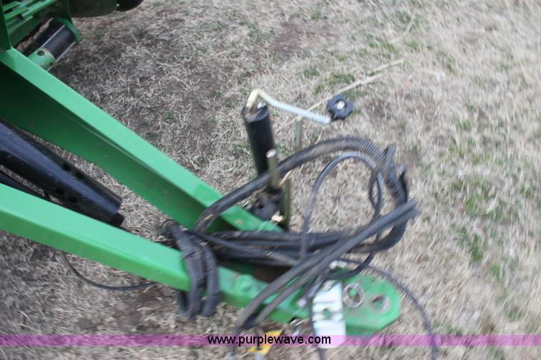 image for item F3466 2012 John Deere 568 round baler